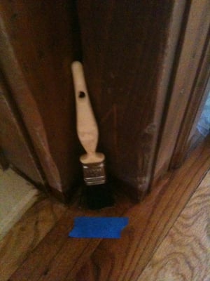 A paint brush that Venice Painting and Power Washing left glued to my floor