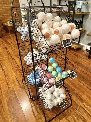 Bath bombs in floral, sweet, earthy, and even manly scents.