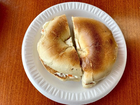 Plain toasted bagel w/vegetable cream cheese.