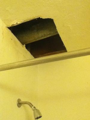 Hole in the ceiling that had mold. They cut out the mold n fixed the leak finally after a month but left this! Stinks BAD