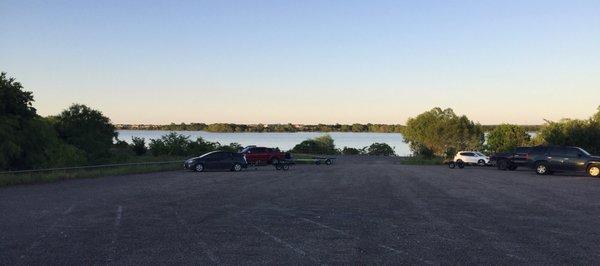 Parking lot with ample room for both vehicles and trailers--boat ramp is at the bottom of the hill straight ahead