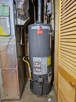 New Rheem water heater installed.