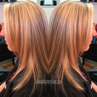 Blonde created with heavy highlighting. Cut created for this client who rarely blow dries but needs her hair to flow and be easy!