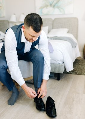 Just a few of my husband putting his shoes on.. there's 16 total.