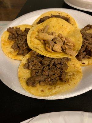 Fajita and chicken tacos! Onion and cilantro on the side!