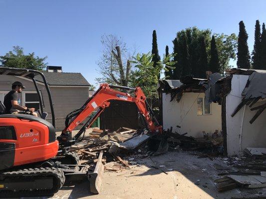 Tearing down a house