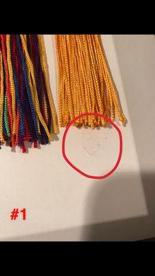 Scuffed original mat kept in brand new $181 job, very visible under tassel