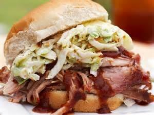 Pulled pork sandwich with homemade slaw and sauce