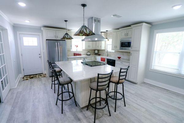 Waypoint cabinets with White Pearl countertops.