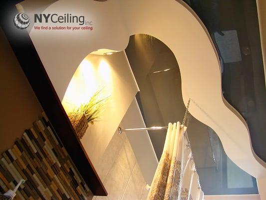 Complete renovation of residential bathroom with glossy stretch ceiling. See more at nyceiling.com/portfolio/project-6/