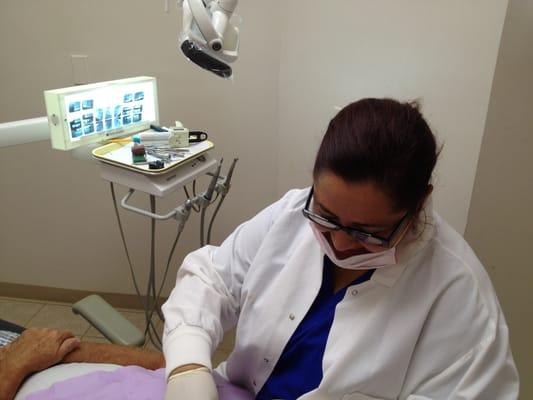 Tammy making a beautiful temporary crown for one of our patients.