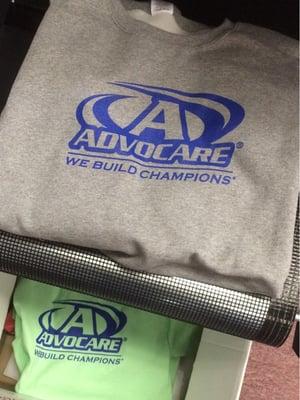 AdvoCare shirts right off the press.