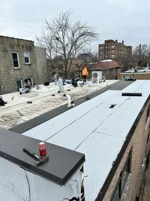 This is a modified roofing system overlay. The previous roof was badly damaged as shown in the picture