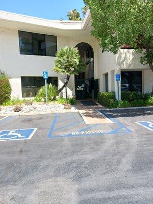 This gate is the easiest way to get in, located on the northwest corner of the building.