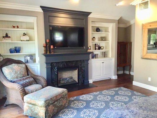 New fireplace and built-in bookcases in master