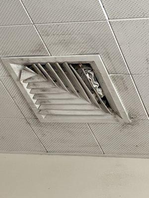 Someone I think had gotten desperate and tried to stiff things in the vent to stop the heat from pouring in. Impossible to sleep.