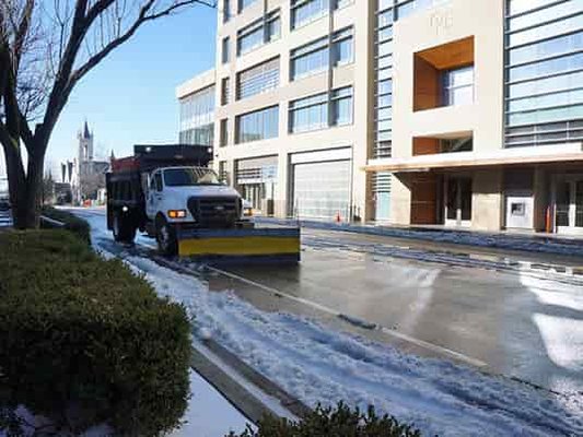 Plowing In Front of a Business