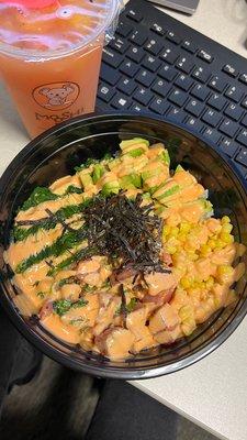 Poke bowl with tuna, white rice, corn, avocado, seaweed salad, topped with spicy mayo & ponzu