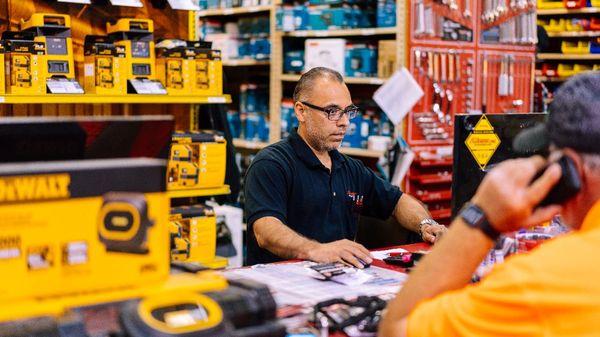 Fasteners Inc team member helping a customer.