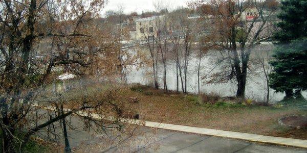 The view from the common area overlooking the Minnesota River and the walking bridge in the town's business district. Fishing is fantastic!