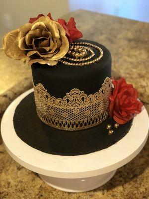 Lace cake with artificial flowers