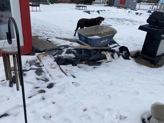 His belongings that he has left in our yard during winter.  Can't clean his mess up