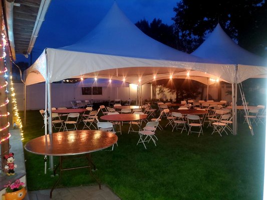 20x40 High Peak Tent Package with warm bistro lights.