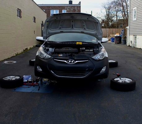 Performing front and rear brake service