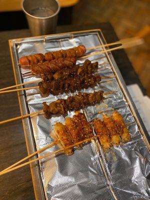 Mini Sausage. Pork Belly with Enoki. Gizzards Skewer.