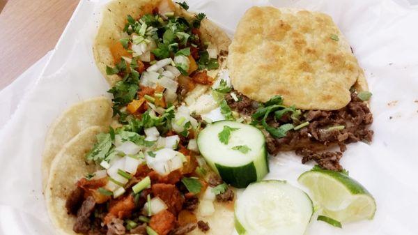 Tacos al pastor and a gordita