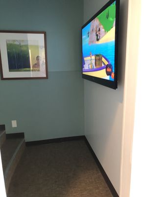 Kids movie room in the waiting area