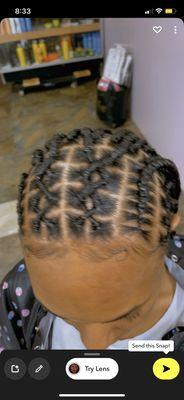 I got some Notless and cornrows in the front with designs