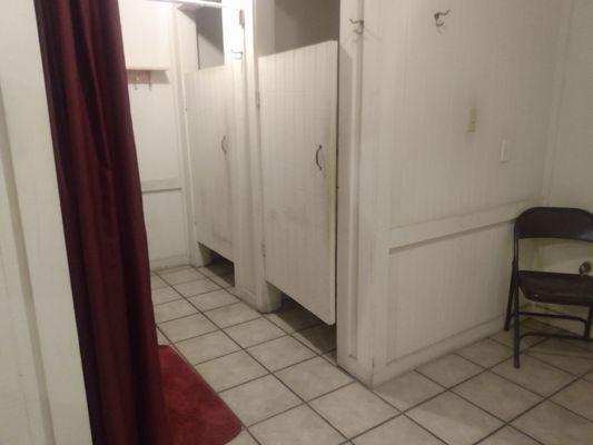 Stalls across from shower area