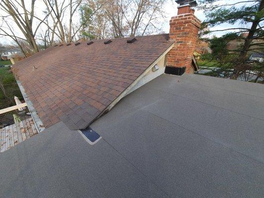 Problem area roof tie-ins and chimney flashing on low pitch roofing