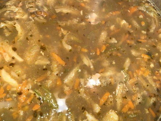 Flaki (beef tripe) soup sold in containers to go.