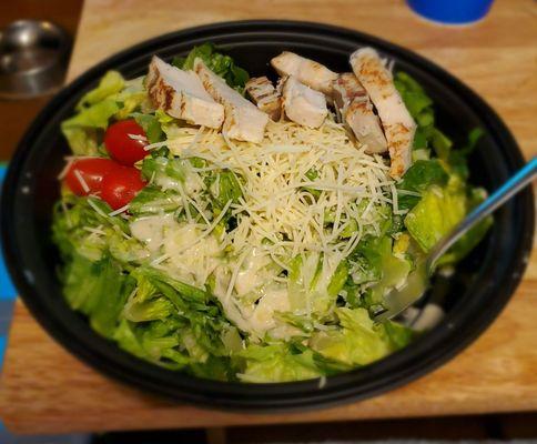 Tender grilled looking chicken Ceasar salad for a fantastic price and plenty of parmesan cheese!!