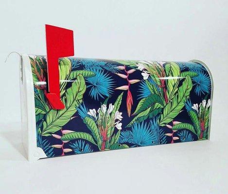 This Hawaiin print is a beautiful blend of colors and flowers, and a perfect addition to your home.