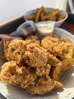 Chicken tenders with extra side of fries