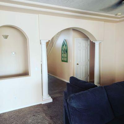 (before) customer wanted arches and columns gone