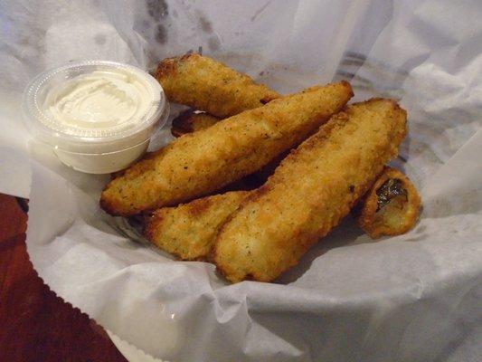 Deep fried pickles with dipping sauce.