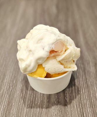 Lychee and mango ice cream with  whipped cream