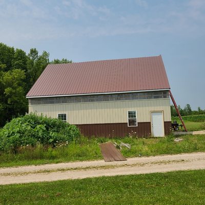 Exposed fastener steel roof