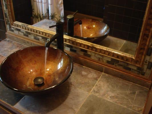 Customer requested a new, custom made counter top with bowl sink.
 Original mirror was cut to fit newly constructed frame, wh...