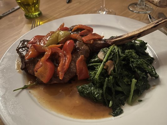 Veal chop with broccoli rabe and peppers