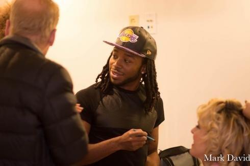 Brandon aka Breezy doing makeup at Stella Bonds fashion show