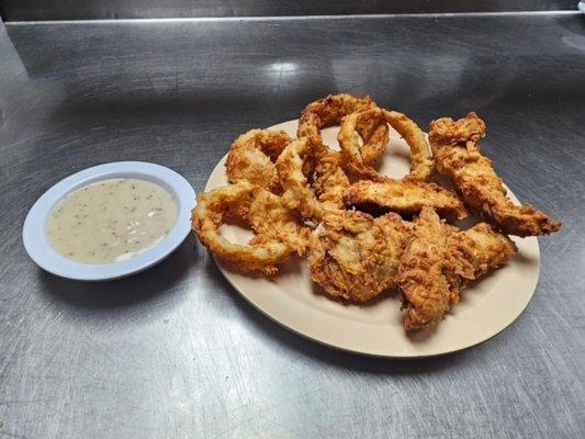 Hand battered Chicken Tenders W/ Homemade Onion Rings & Gravy