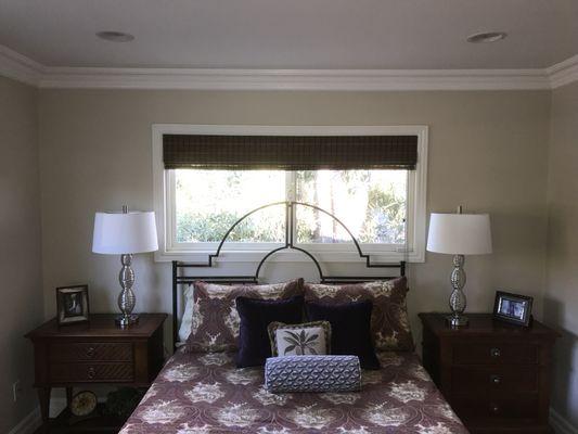 Guest bedroom. Desert tan color with white 8" crown moulding.