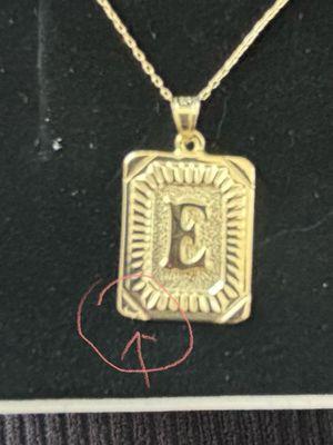 Note blemished lower left corner of pendant.