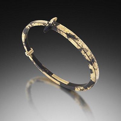 Pat Flynn: "Dust Nail Bracelet" one of a kind bracelet made of mixed steel and 22k gold.