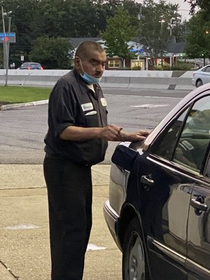 I came here to get gas today and this gas station attendant, Navarajan, was completely rude and spat right by my car. Unacceptable.